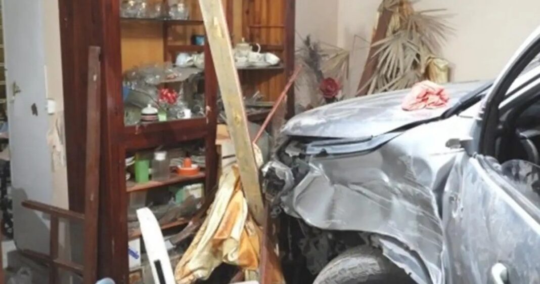 Ilustración de una camioneta y una casa, representando el hecho ocurrido en Chubut.